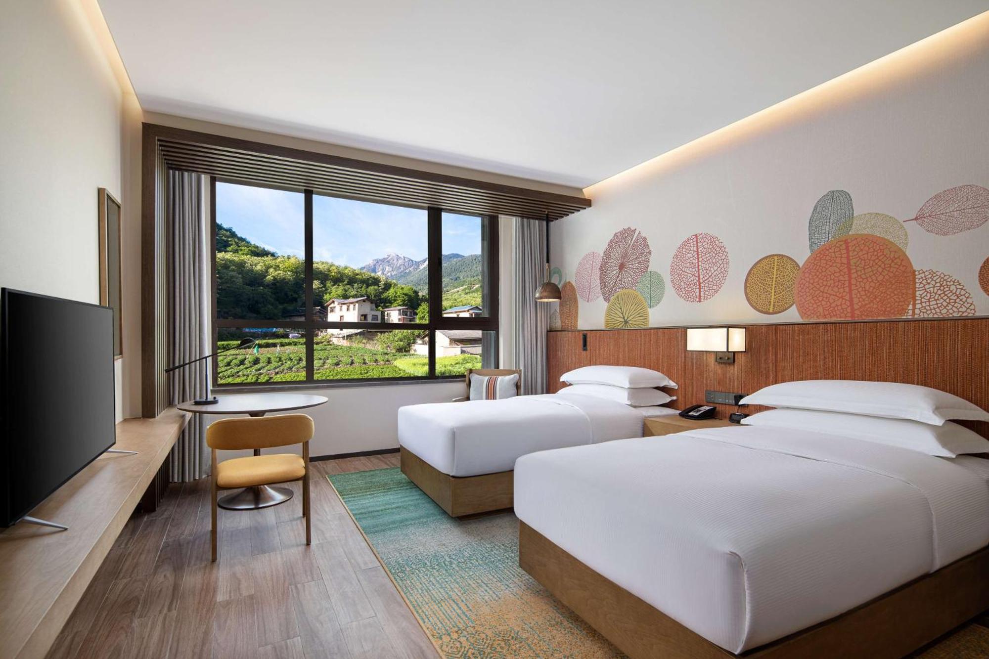 Hilton Garden Inn Цзючжайгоу Экстерьер фото